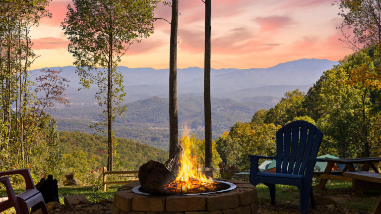 Smoky Mountain fire pit surrounded by wooden chairs.