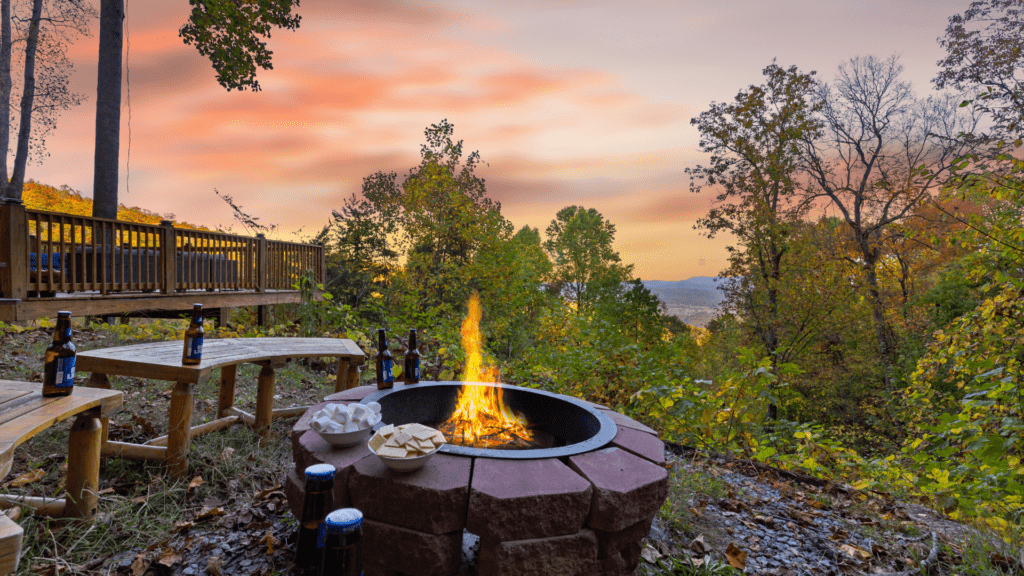 Smoky Mountain cabin with firepit and sunset view.