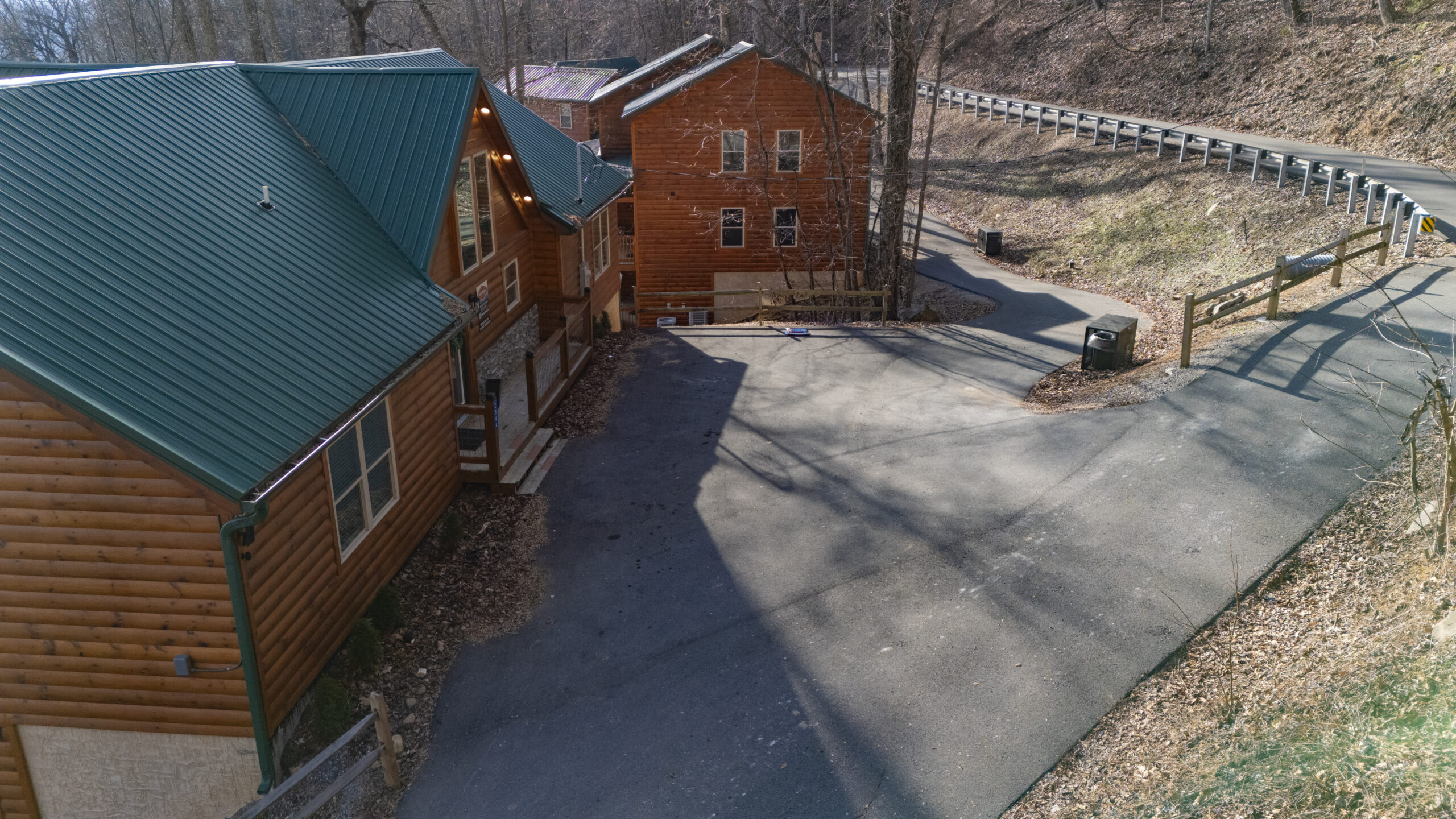 Aerial view of a Smoky Mountain cabin community and parking areas
